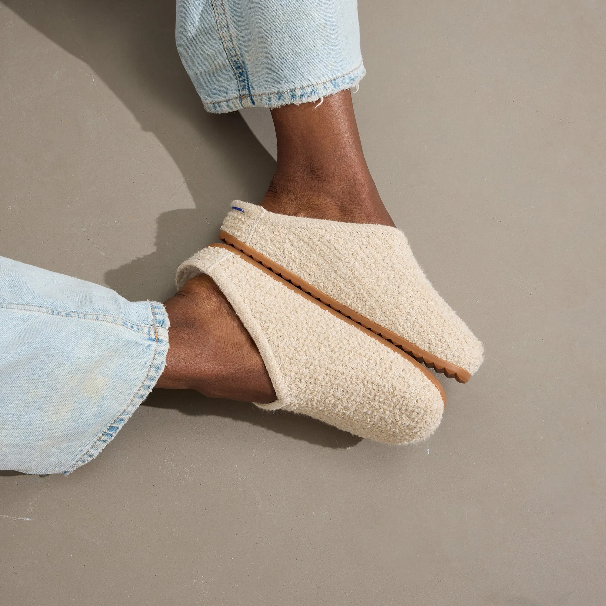 The Cozy Clog - Honeybun Bouclé. Optimize the title of this e-commerce product and return a version with descriptive modifiers.

Optimized Title: Warm and Plush Honeybun Bouclé Cozy Clog Slippers